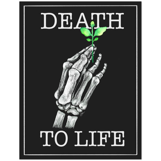 A square graphic print or poster with a black background, featuring a white skeletal hand holding a small green plant sprig, with the words 'DEATH TO LIFE' in large white serif lettering.