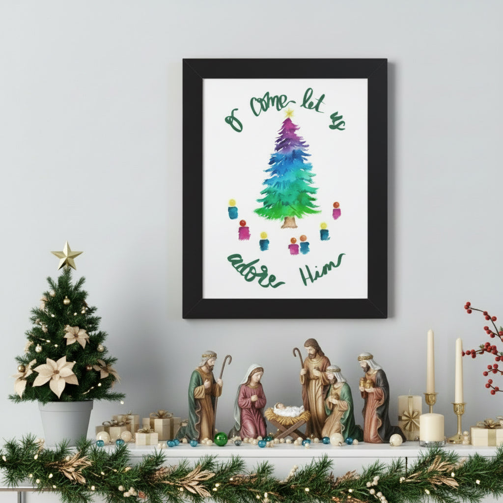 Framed artwork with a colorful Christmas tree and text on a white wall above a desk with plants.