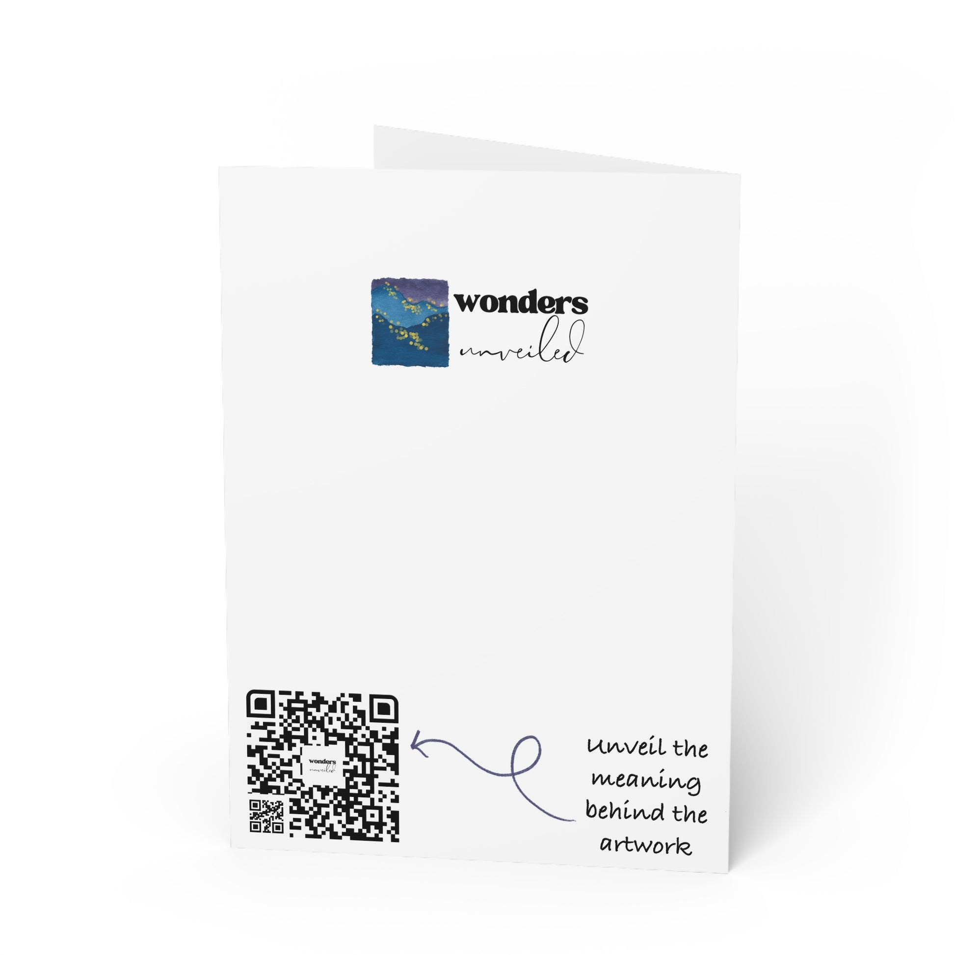 Greeting card with QR code and ‘wonders unveiled’ text on a white background
