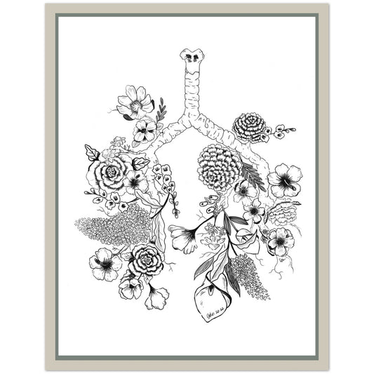 A framed black and white art print featuring a stylized anatomical lung illustration filled with flowers and leaves, shown against a light gray background.