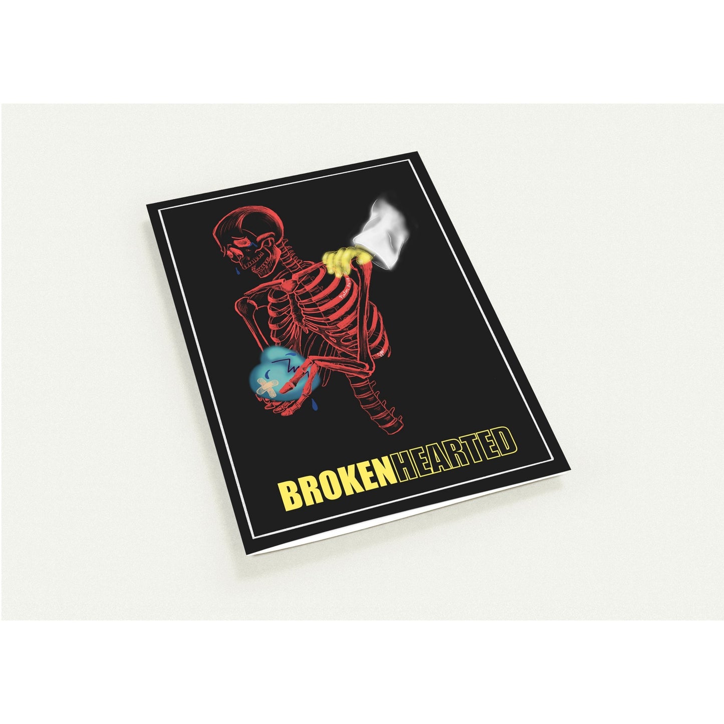A square black card featuring a stylized red skeleton holding a blue globe and a white flag, with the text 'BROKEN HEARTED' in yellow at the bottom, shown on a light gray background.