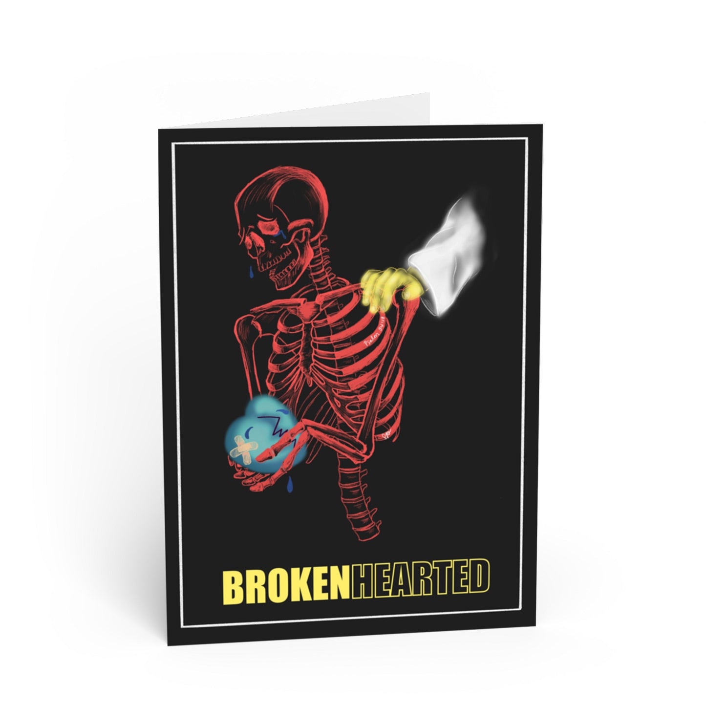 A black greeting card featuring a red skeleton holding a blue heart and blowing a white cigarette, with the text 'BROKENHEARTED' in yellow at the bottom, shown on a white background.
